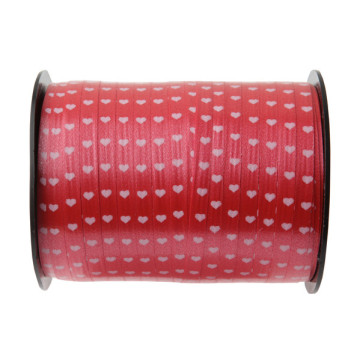 Rouleau de bolduc rouge cœurs blancs